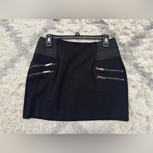 Guess Dresses & Skirts - Guess Daisy Knit Stretch Skirt Size L
Black Zipper Detail Skirt
WORN ONE TIME